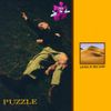 Puzzle - Laying In The Sand