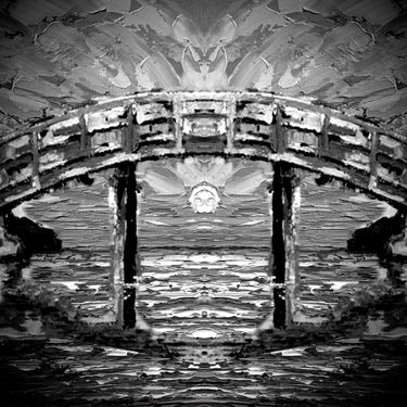 many tiny boxes - far beneath the bridge